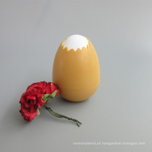 Garrafa cosmética plástica da forma agradável do ovo da cor do ouro
